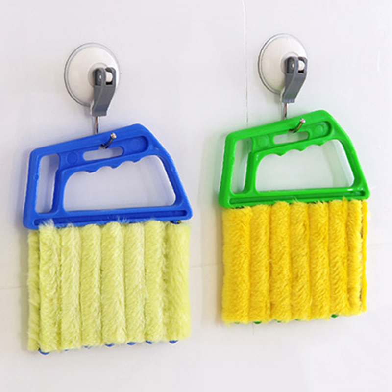 Cleaning brush for tight spaces with reusable microfiber covers