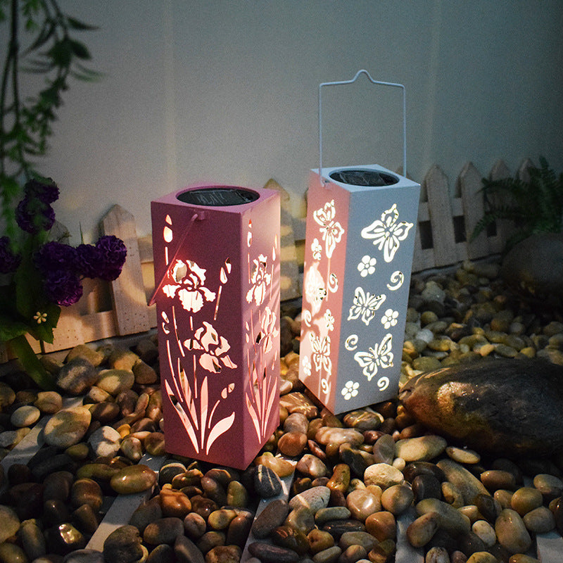 Decorative outdoor lamp with butterfly and flower design