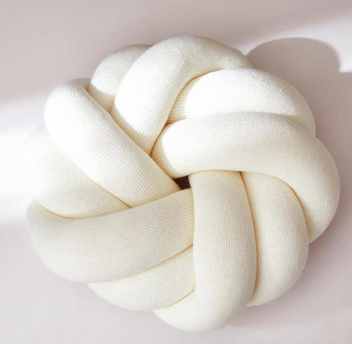 Weave-Stylish Knot Pillow for Modern Comfort