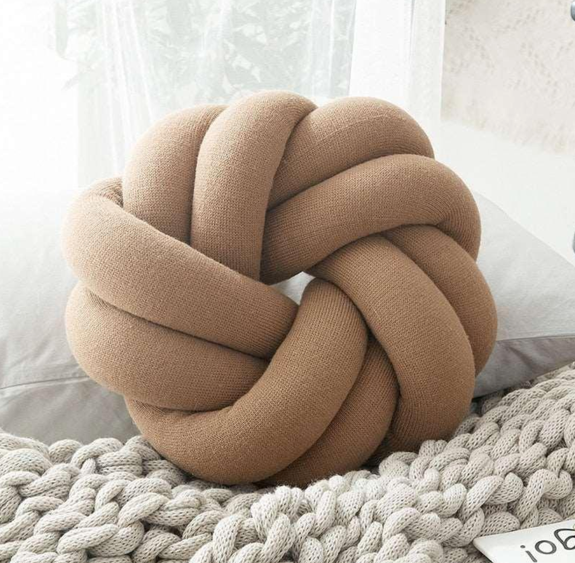 Weave-Stylish Knot Pillow for Modern Comfort