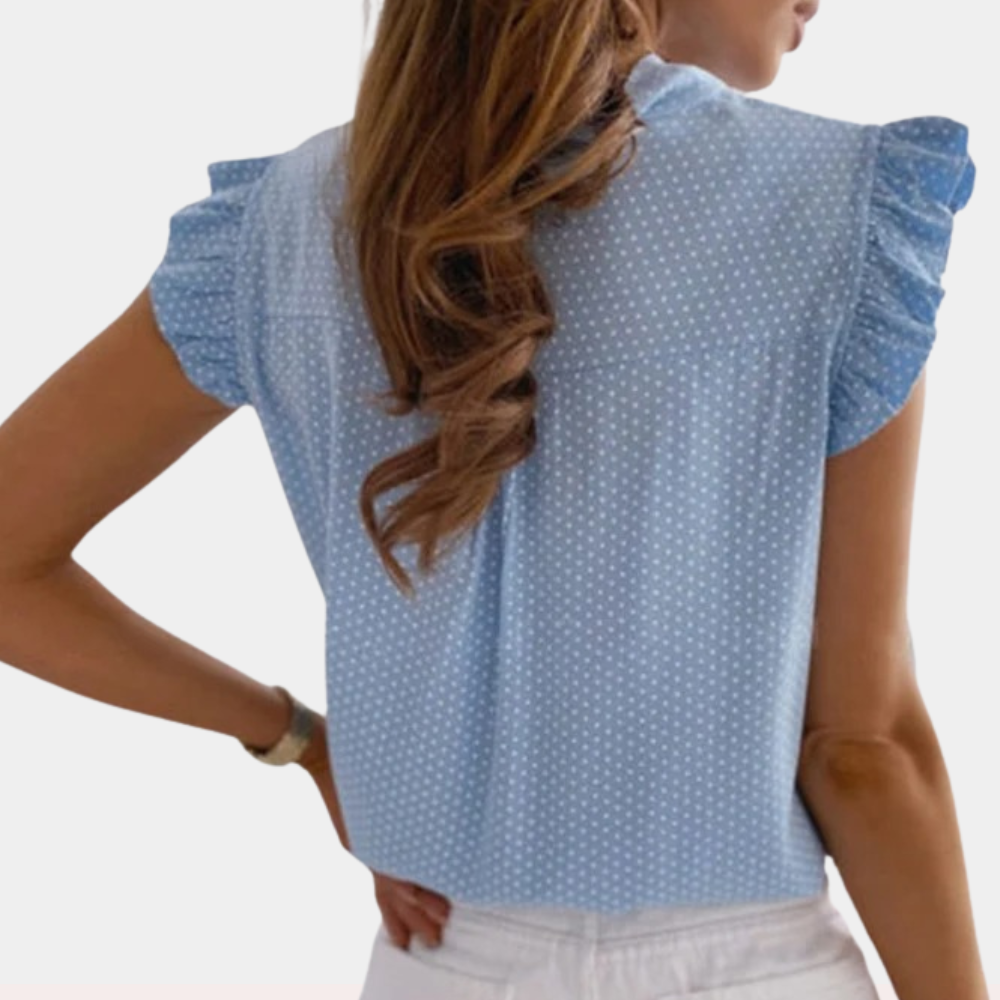 Kira - Polka Dot Blouse with Ruffled Neckline and Butterfly Detail