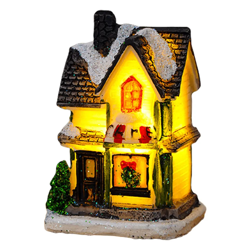 Illuminated holiday village house